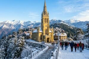Historic Christ Church in Shimla under a bright blue sky and snow